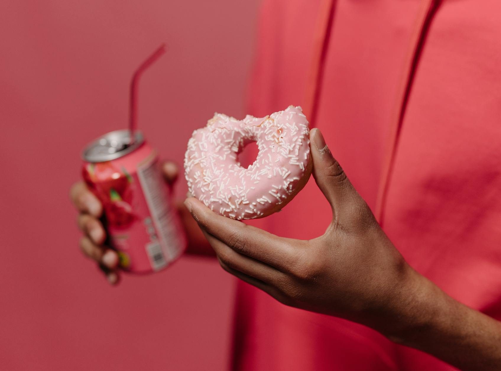 person holding doughnut